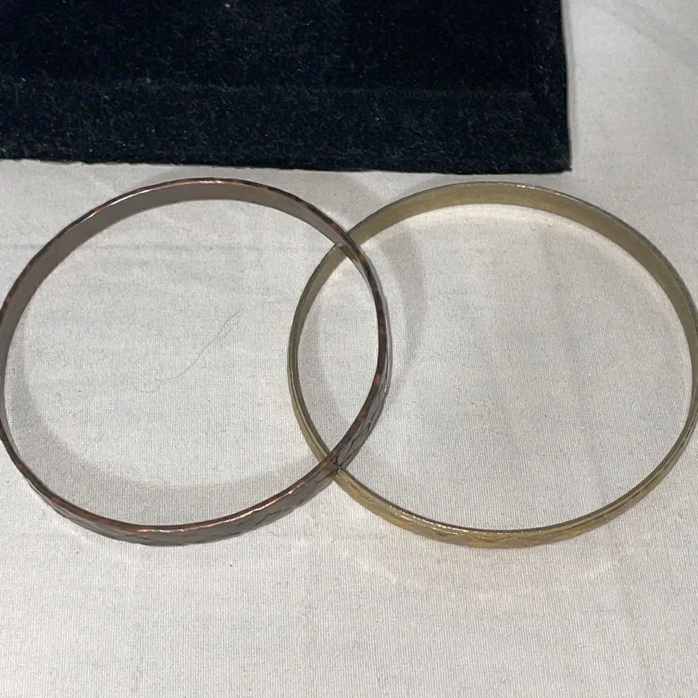 Two bangle bracelets